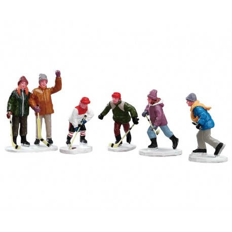 Famille jouant au hockey Lemax Vail Village