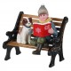Enfant et son chien sur un banc Lemax