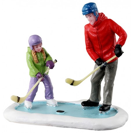 Hockey sur glace entre père et fille Lemax
